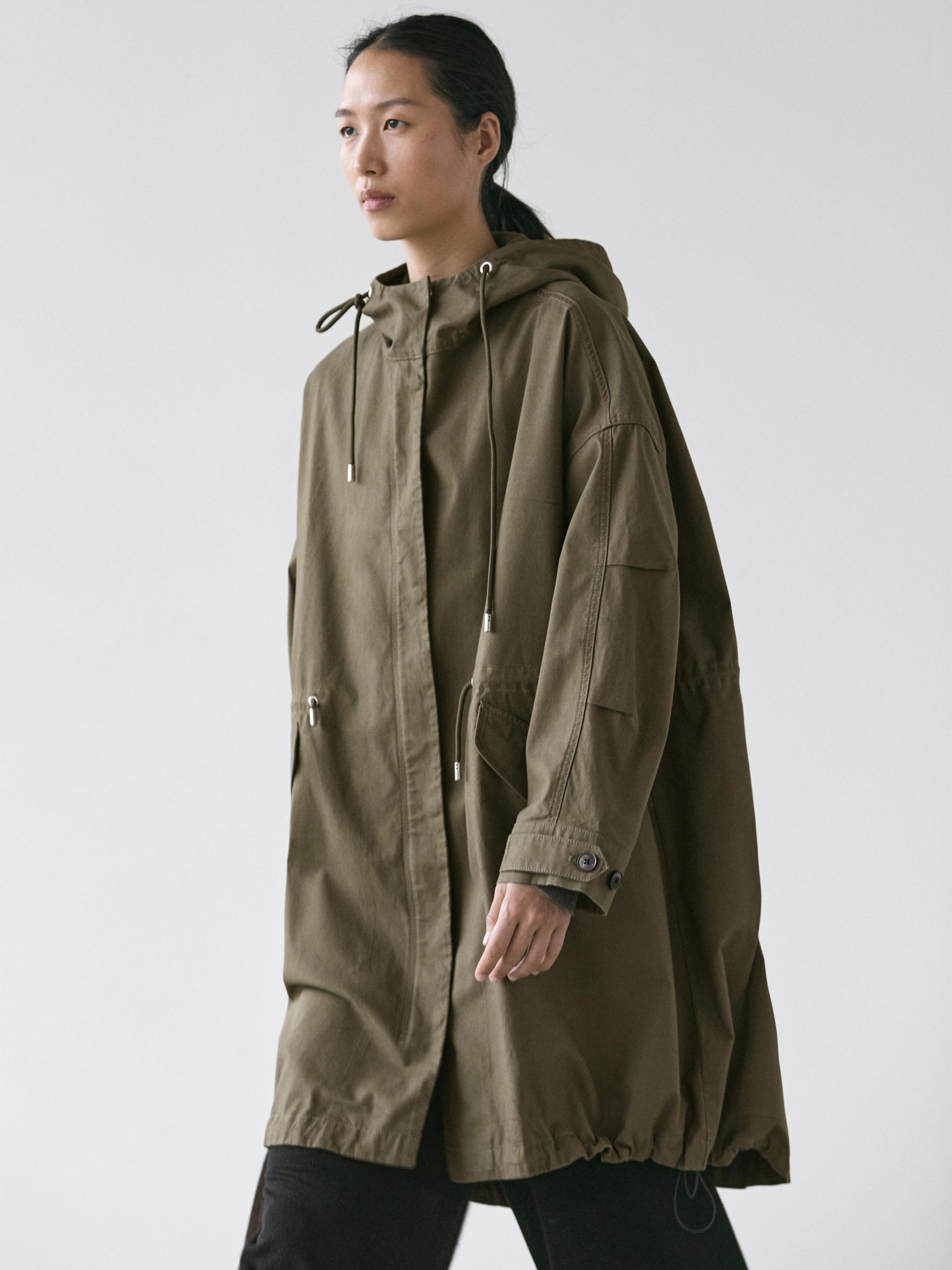 Trench tissu technique à capuche